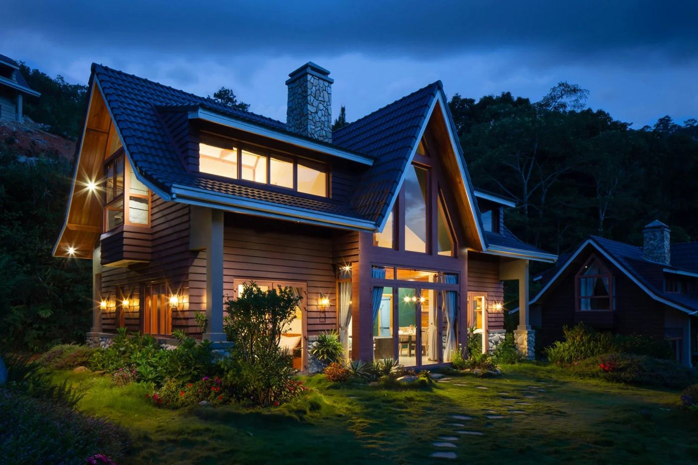 Home at dusk with lights on