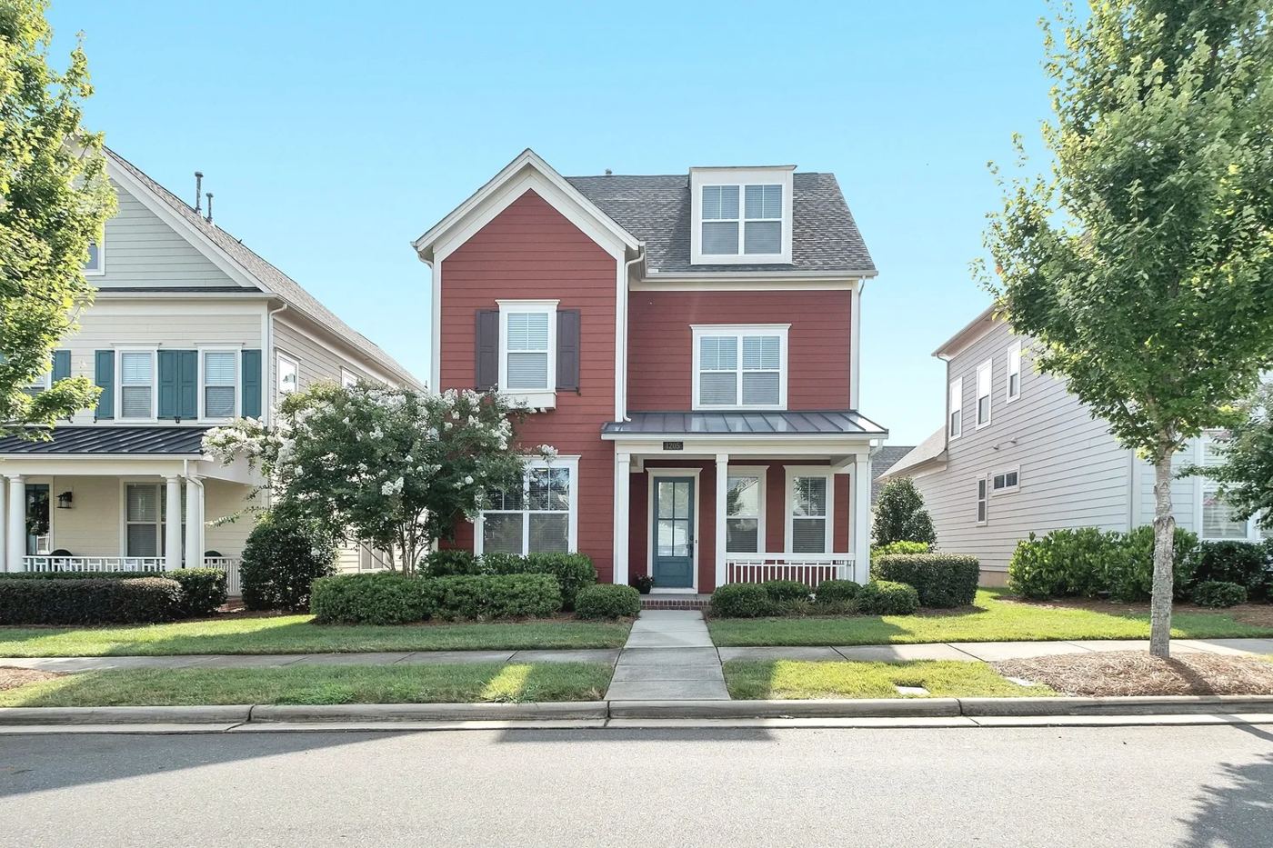 Two-story home on a tree-lined street